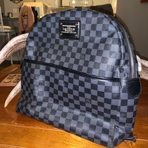 Grey and black Louis Vuitton backpack
